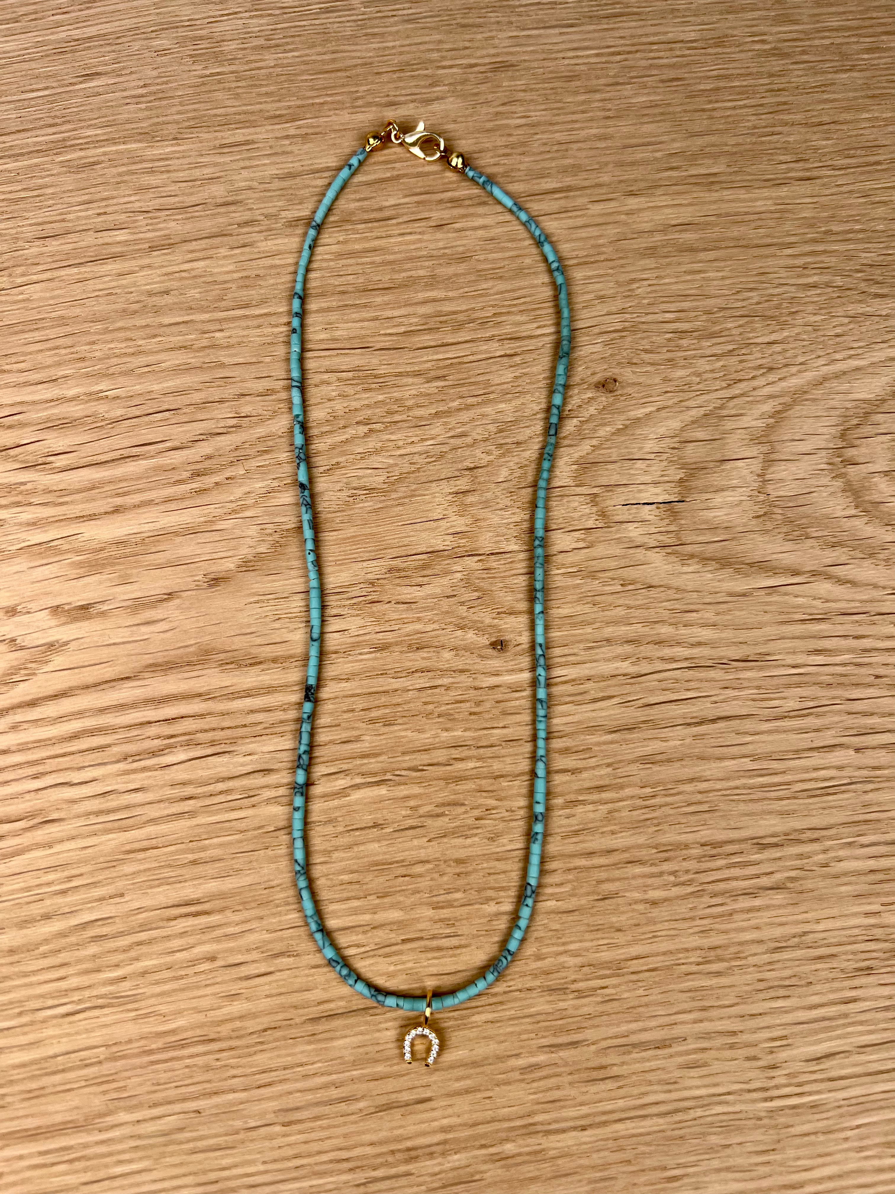 Kette türkis mit Glücksanhänger Gold