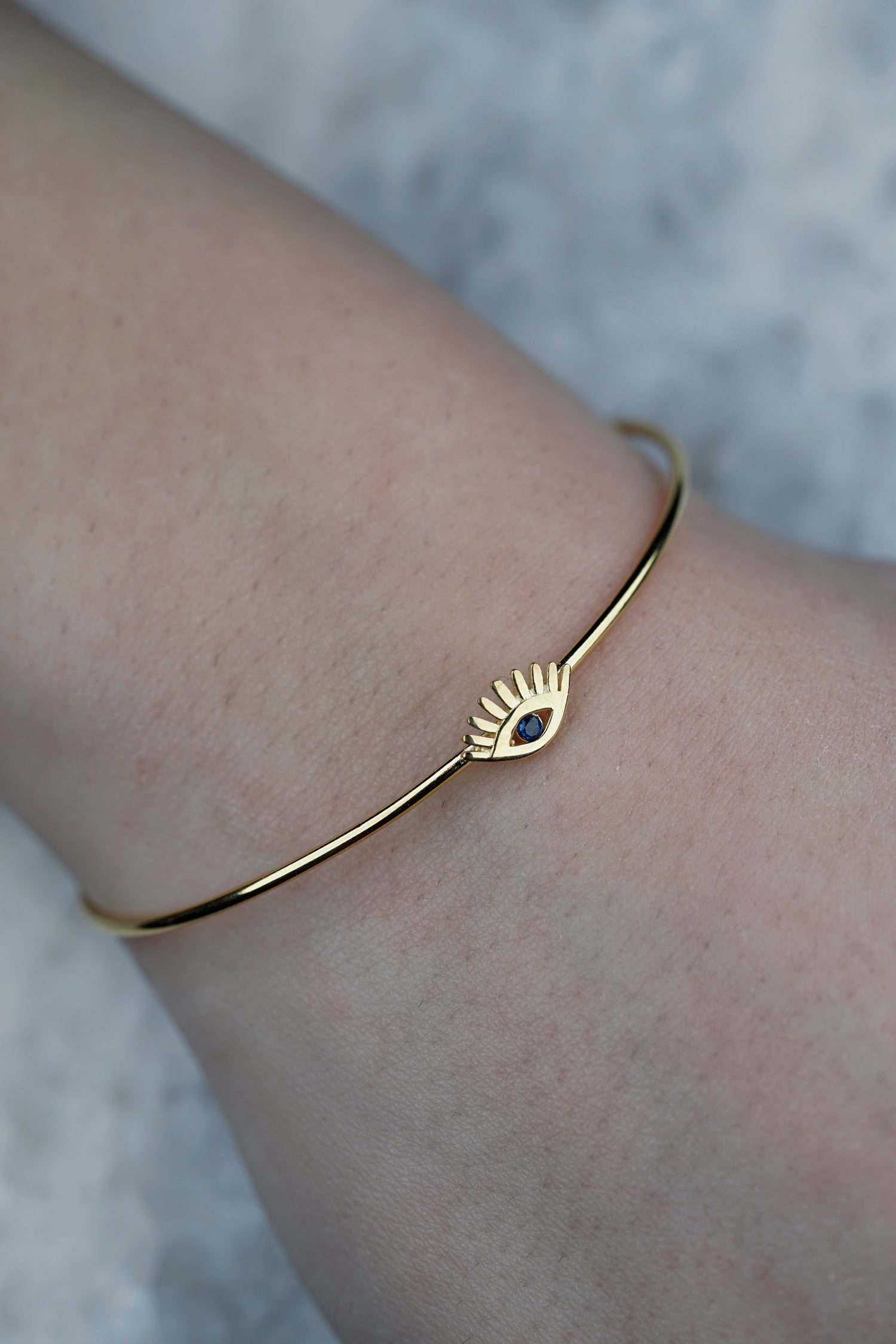 Armreif MAGIC BLUE EYE gold