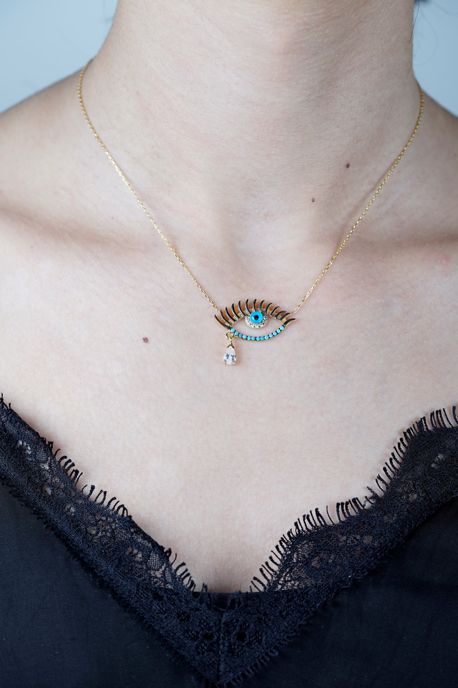 Kette MAGIC BLUE EYE mit Träne gold