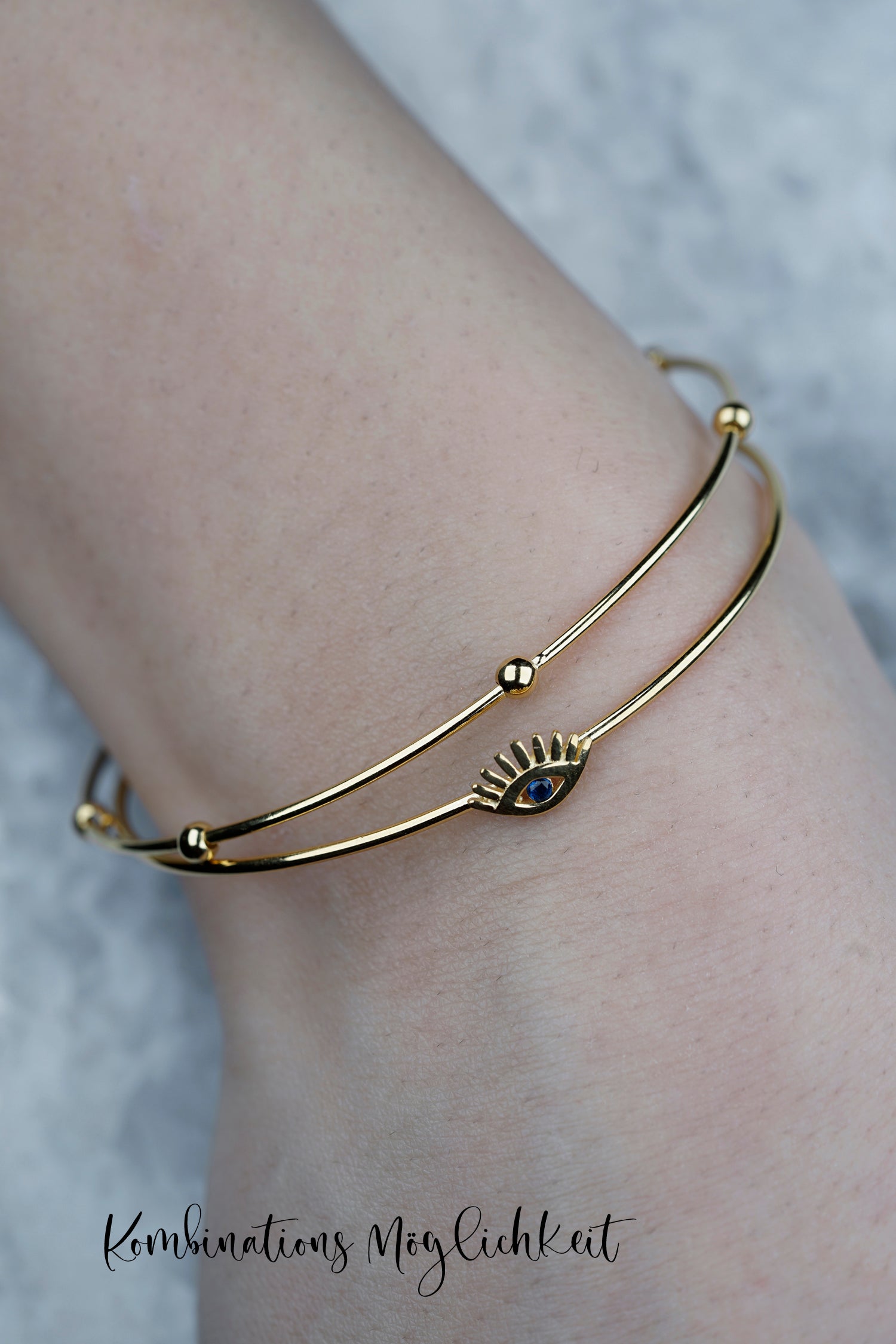Armreif MAGIC BLUE EYE gold