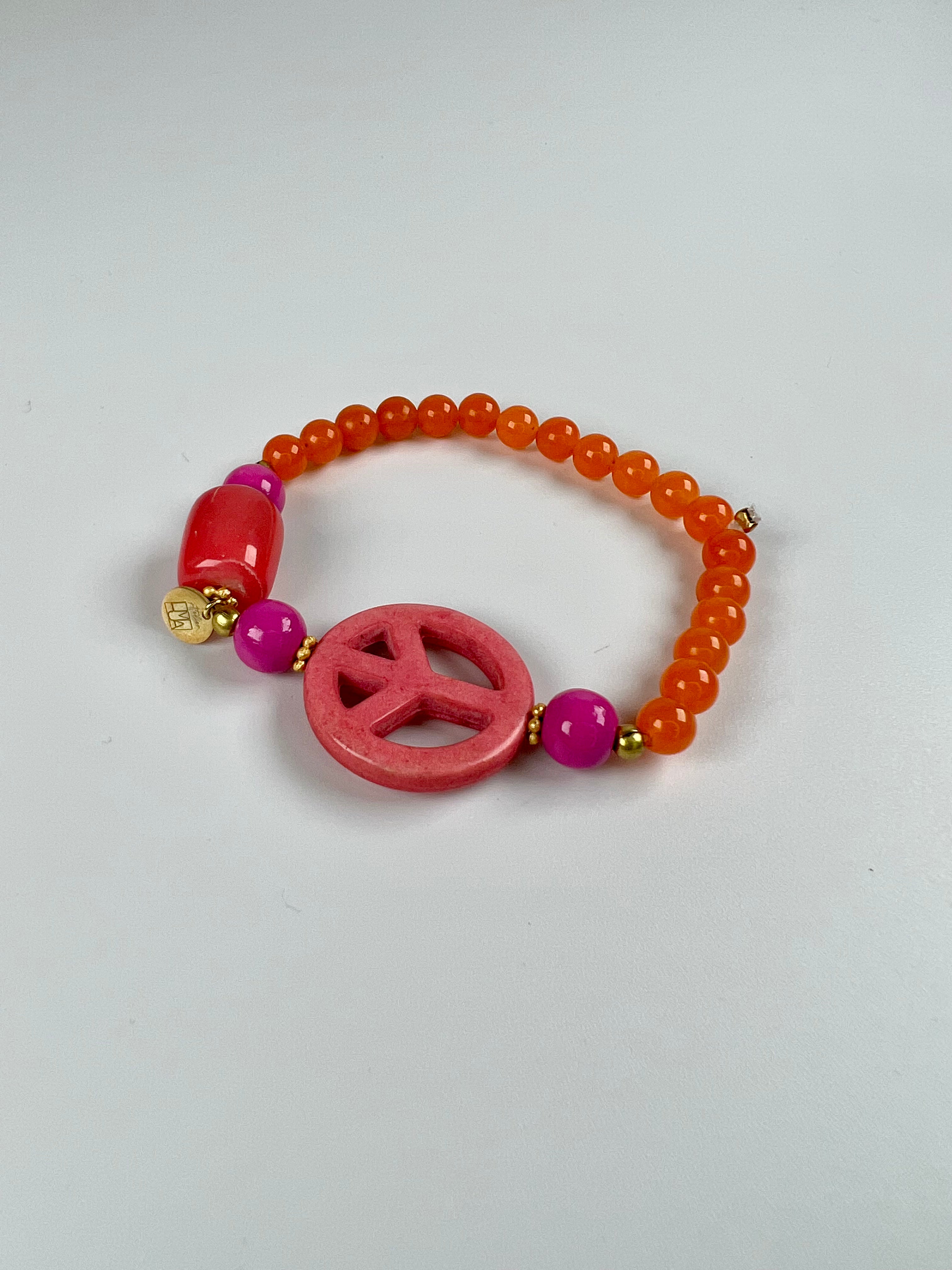 Armband aus Carneol, Koralle, Holzperlen und Goldelementen